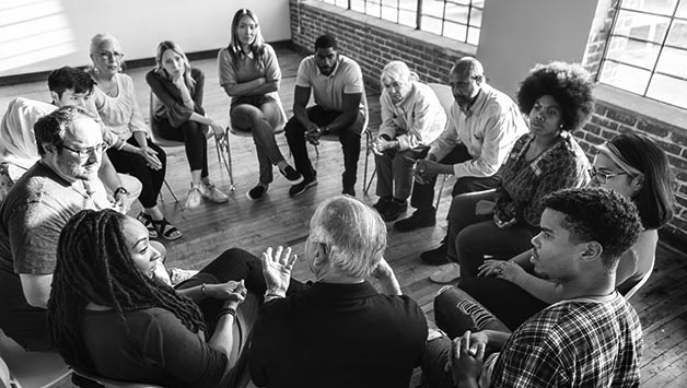 senior man talking smoking support group