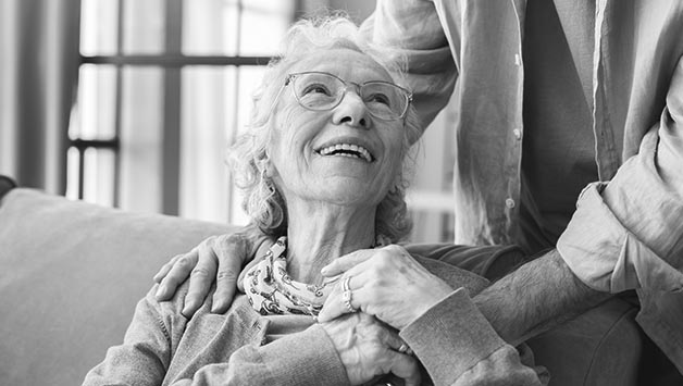 senior woman with dementia receiving care at home