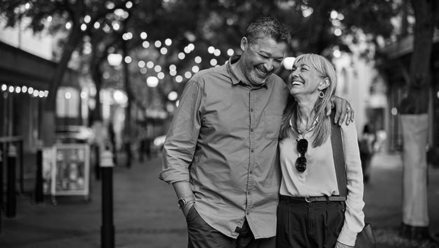 couple walking through a market